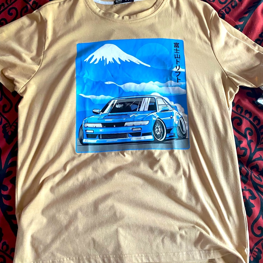 Oversized graphic tee. Tan and blue cotton. Oversized a little